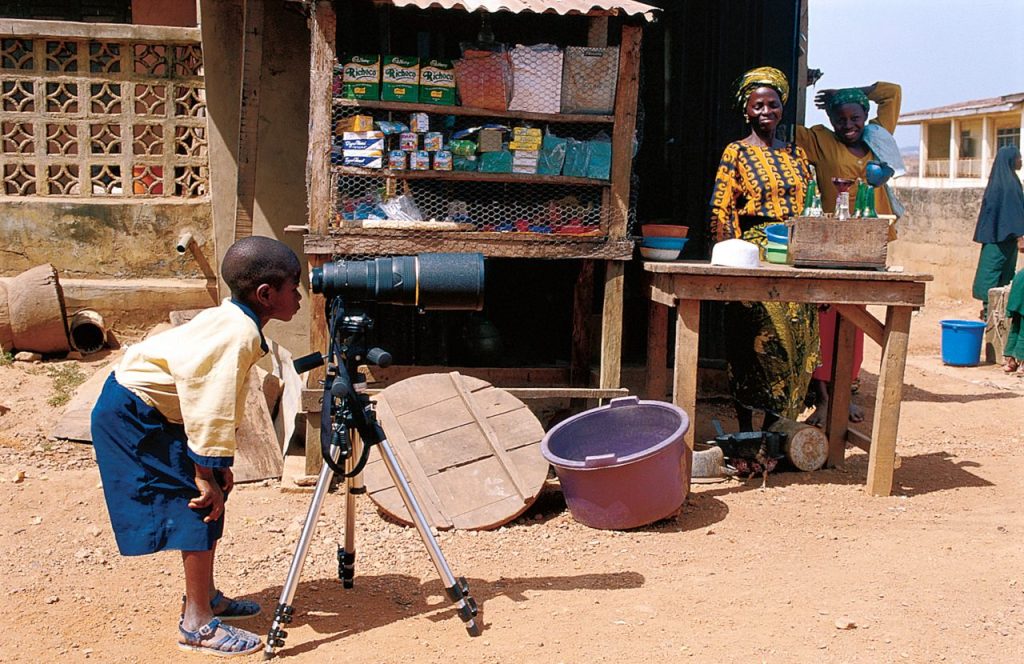 African Boy and Telescope